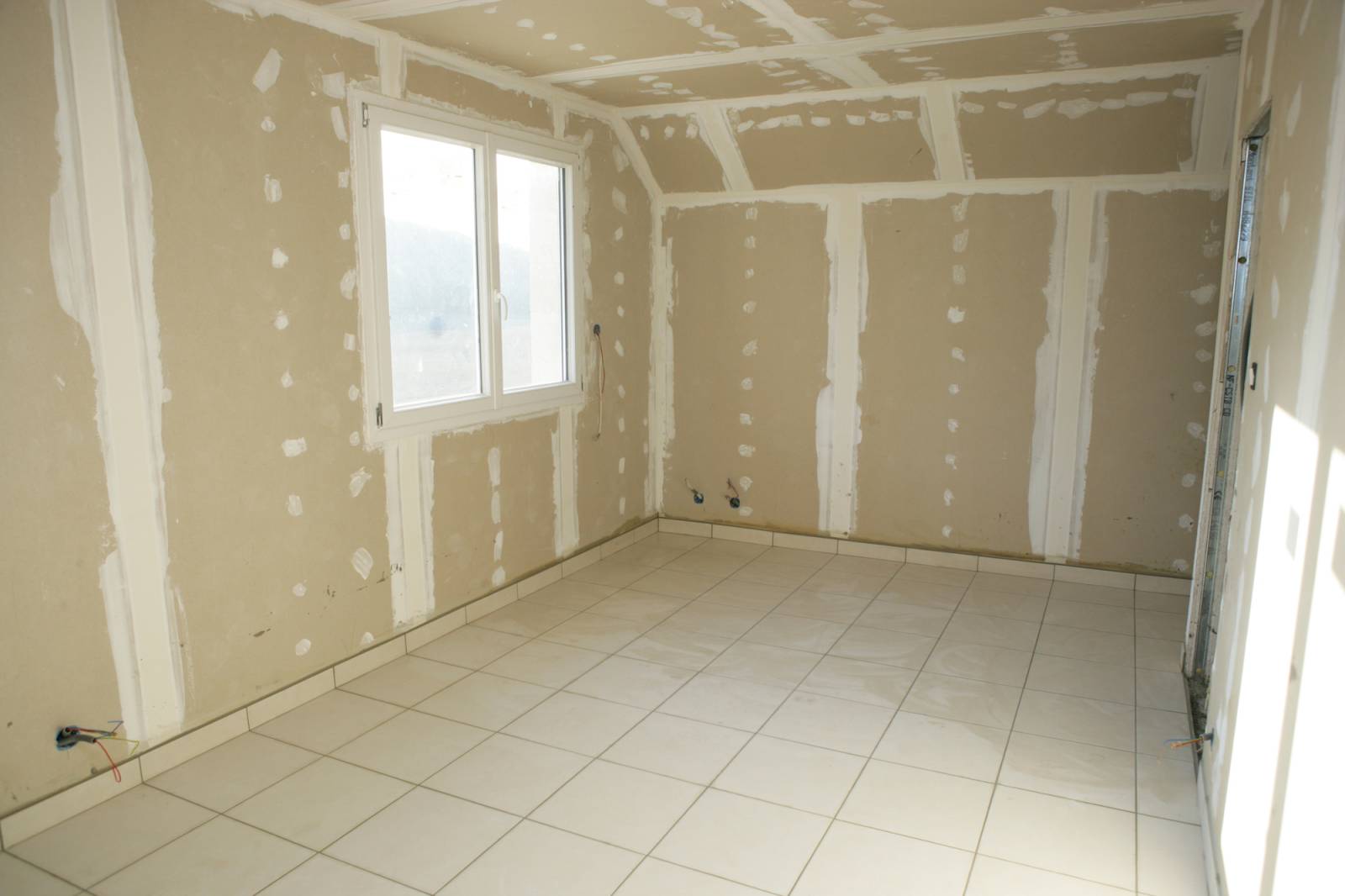Pose de plaque de plâtre pour créer une pièce supplémentaire dans un appartement à Lyon 7 Gerland