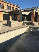 Réhabilitation d'une maison individuelle et son extérieur à Dardilly